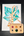 Color swatch card with watercolor paint samples and a painting of a snake on a leaf.