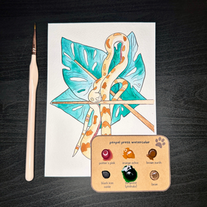 Color swatch card with watercolor paint samples and a painting of a snake on a leaf.