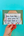 Hand holding a card with a handwritten message on a teal background