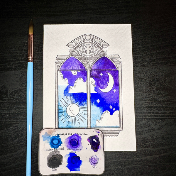 Artistic depiction of a stained glass window with celestial design on paper, accompanied by a paintbrush and color palette.