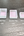 Three small translucent square pans in different sizes labeled Half Pan (2ml), Quarter Pan (1ml), and Mini Pan (.5ml) on a dark textured surface.
