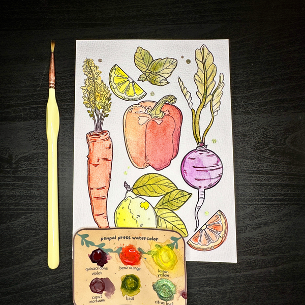 Sheet of watercolor illustrations of fruits and vegetables with a paintbrush and color chart on a dark surface.