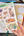 Sheet of cat-themed stickers held by a hand with a ruler and pencil in the background