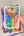 Colorful rainbow flag sticker with intricate designs held by a hand on a light background