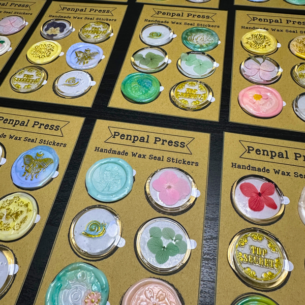 Collection of Penpal Press handmade wax seal stickers on display